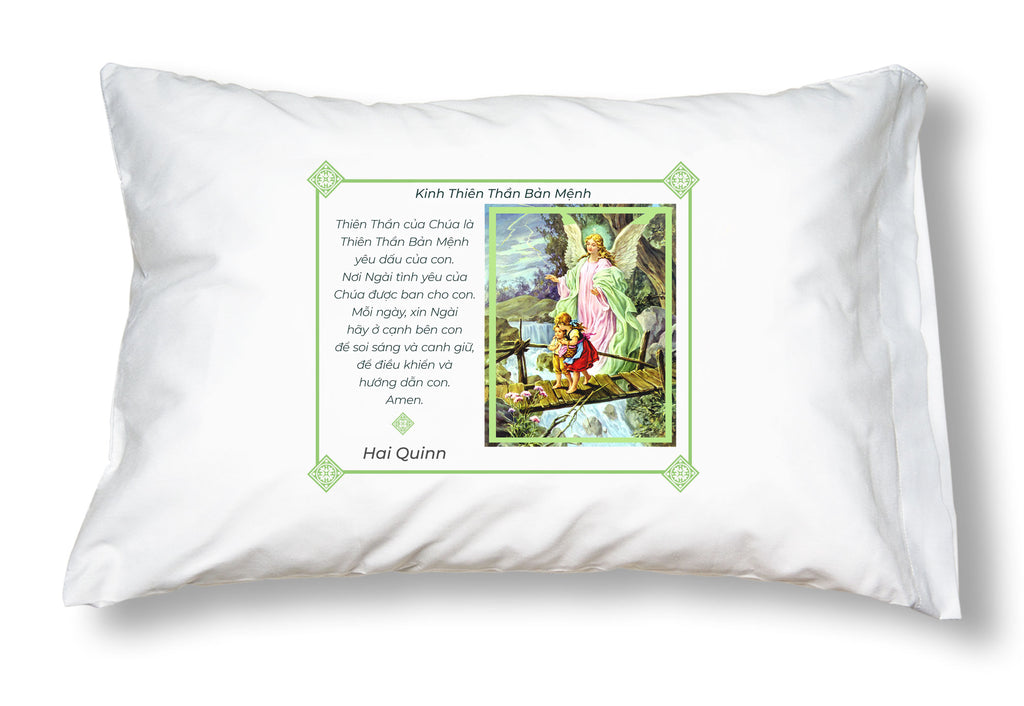 White pillowcase with image of an angel and the words of the guardian angel prayer in Vietnamese, personalized.