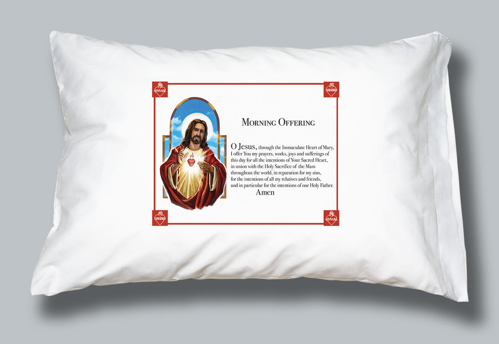 White pillowcase with and image of the Sacred Heart of Jesus and the words of the Morning Offering prayer