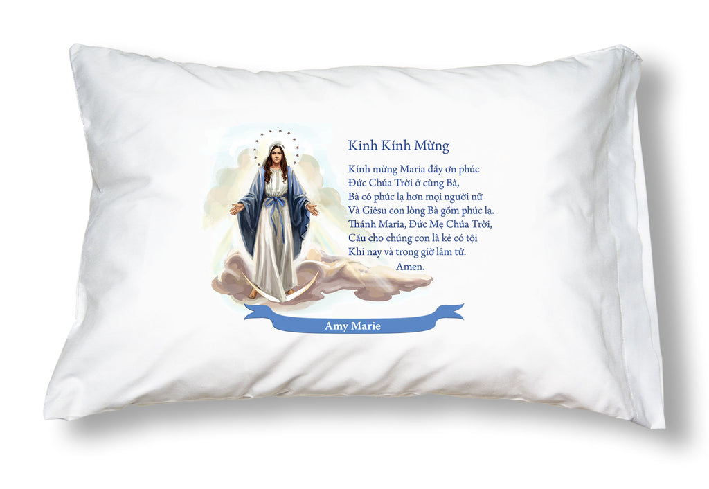 White pillowcase printed with the Catholic Hail Mary prayer in Vietnamese and an image of Our Lady of Grace.