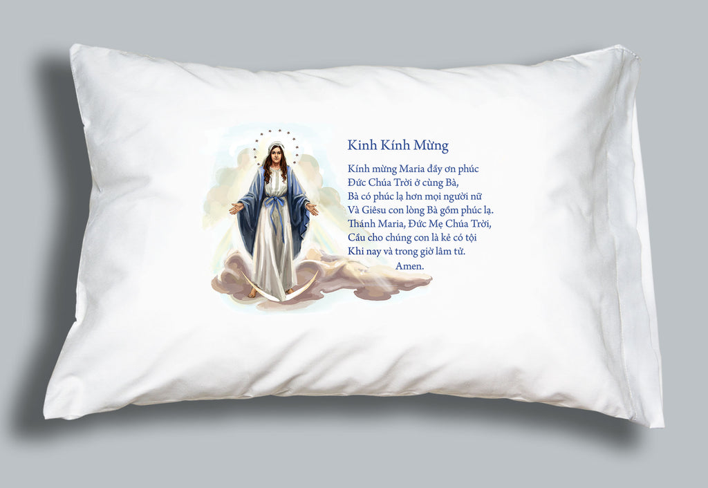 White pillowcase printed with the Hail Mary prayer in Vietnamese and an image of Our Lady of Grace.