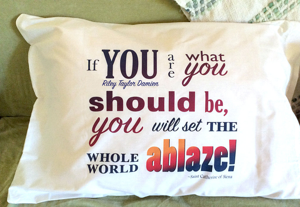 white pillowcase colorfully printed with with St. Catherine of Siena quote for Catholic teens